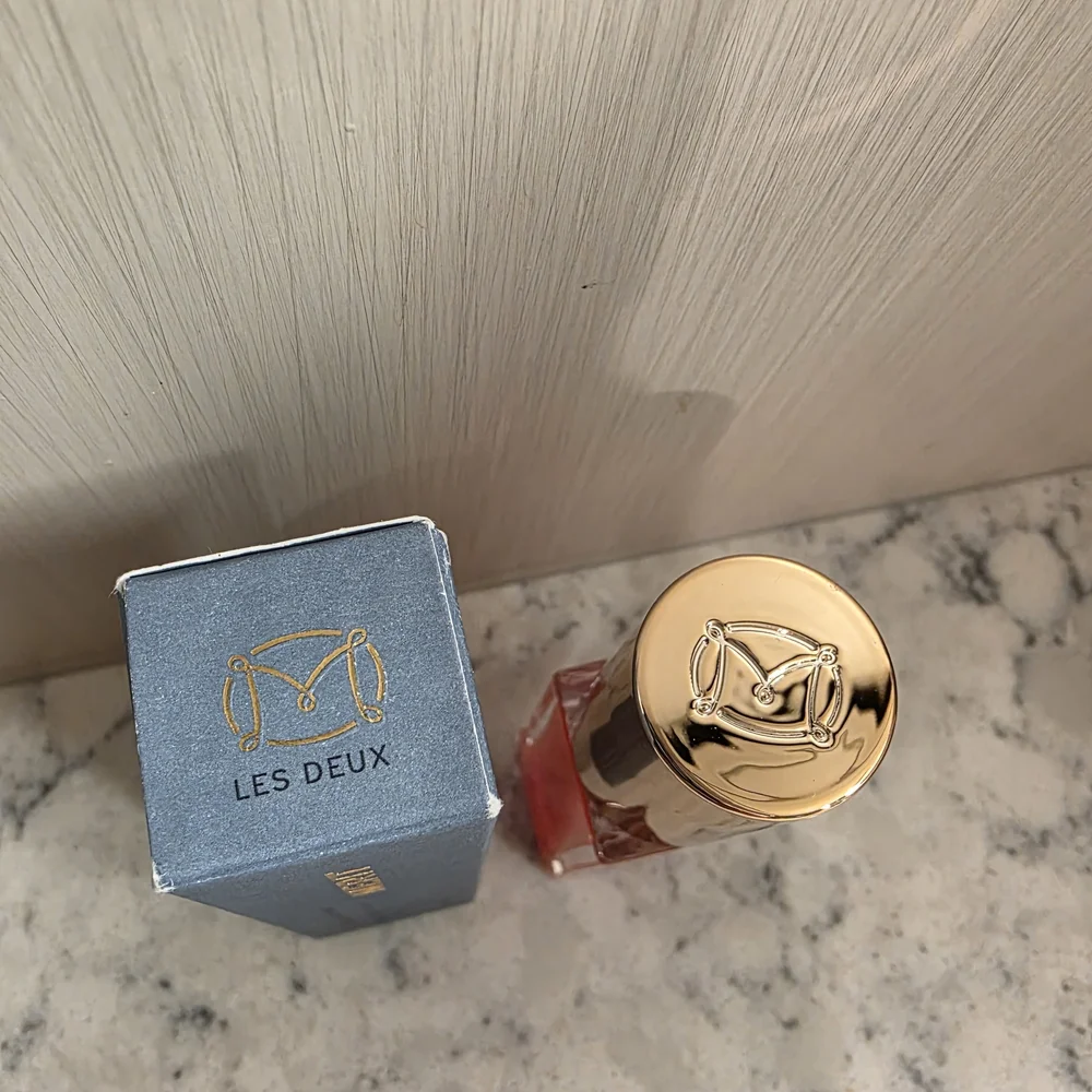 Merit Shade Slick Gelée Tinted Lip Oil in the shade 